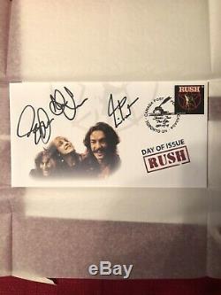 RUSH Canadian 1st Day Cover Autographed By Lee, Lifeson, & Peart. #5/10